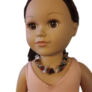 Charming Doll with Pink Outfit and Beaded Necklace
